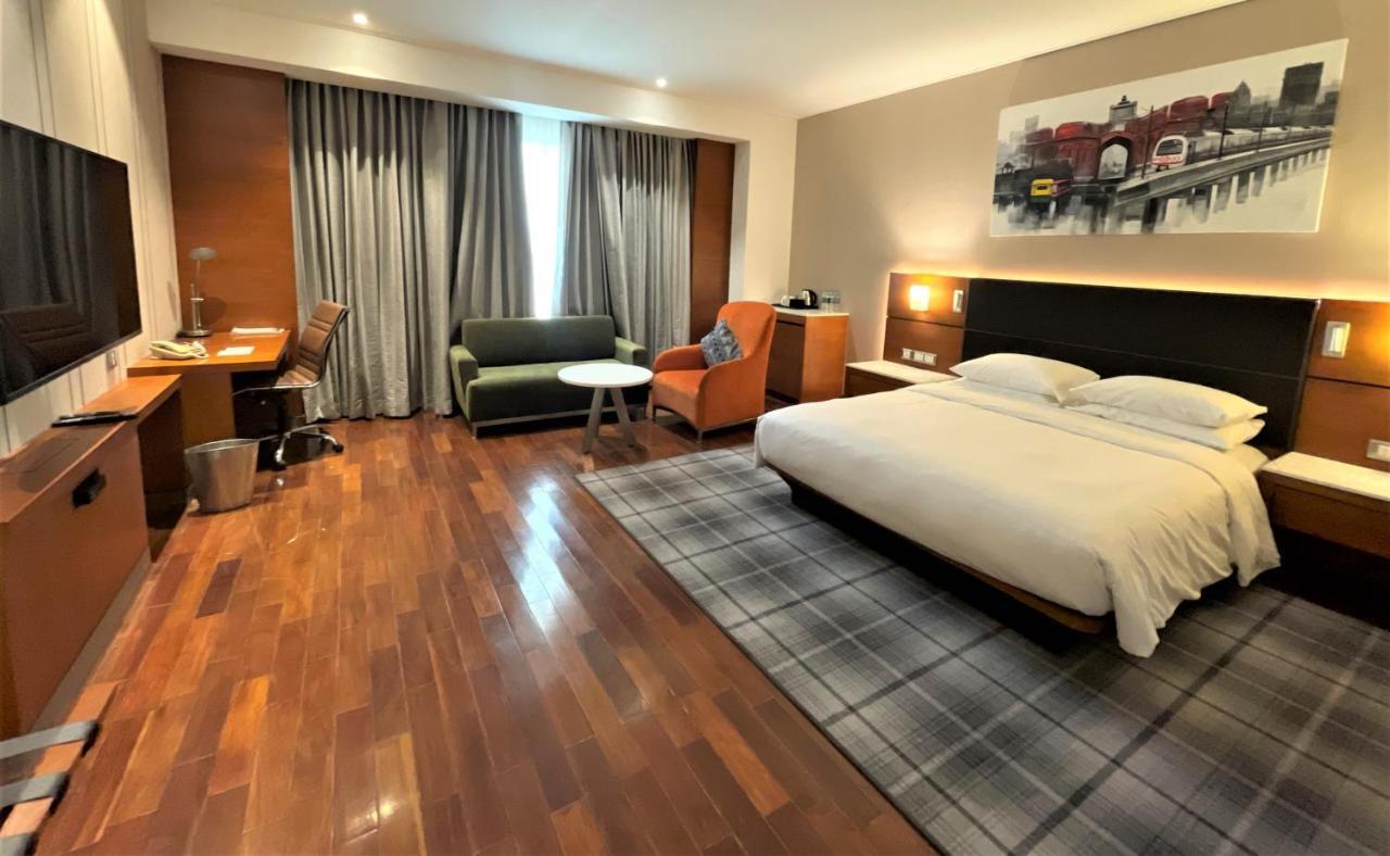 Отель Hyatt Centric Janakpuri Нью-Дели Экстерьер фото A room at the hotel