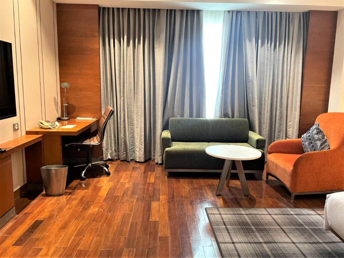 Отель Hyatt Centric Janakpuri Нью-Дели Экстерьер фото A room at the hotel